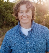 A man smiling for the camera.