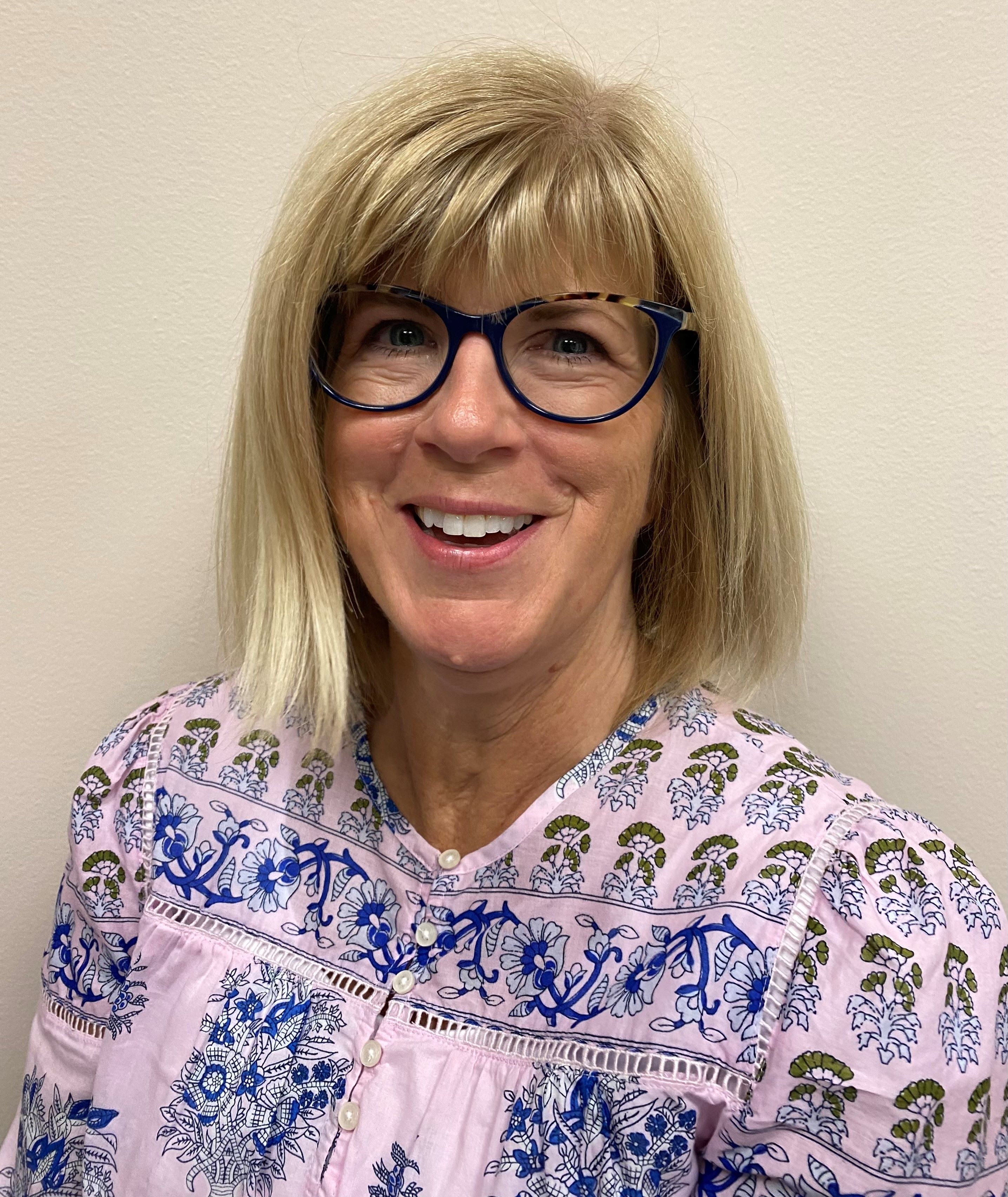 A person wearing glasses.