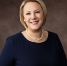 A woman smiling for the camera.