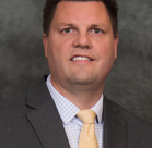 A man in a suit and tie.