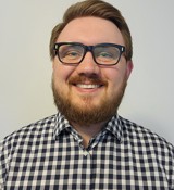 A man wearing glasses.