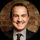 A man smiling for the camera.