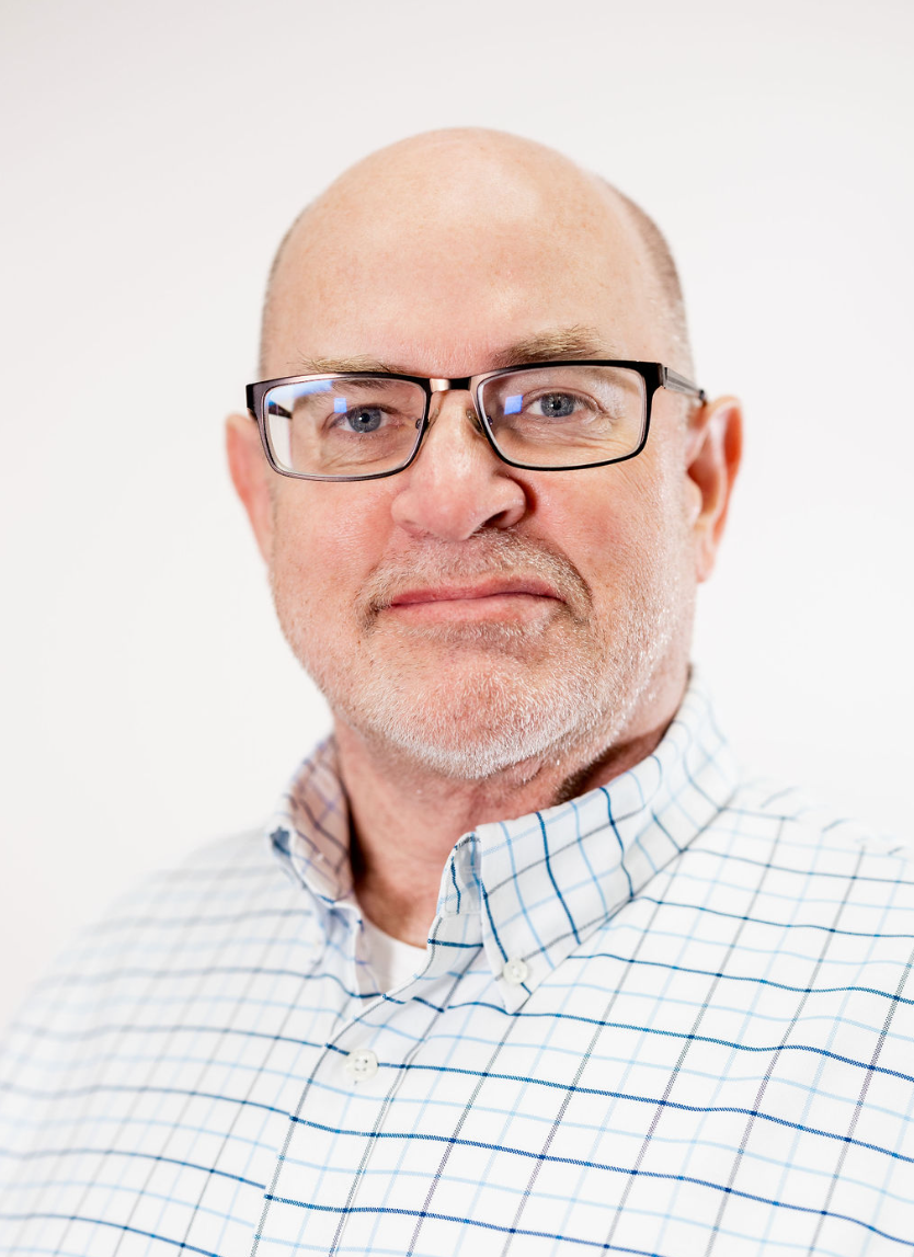 A man wearing glasses.