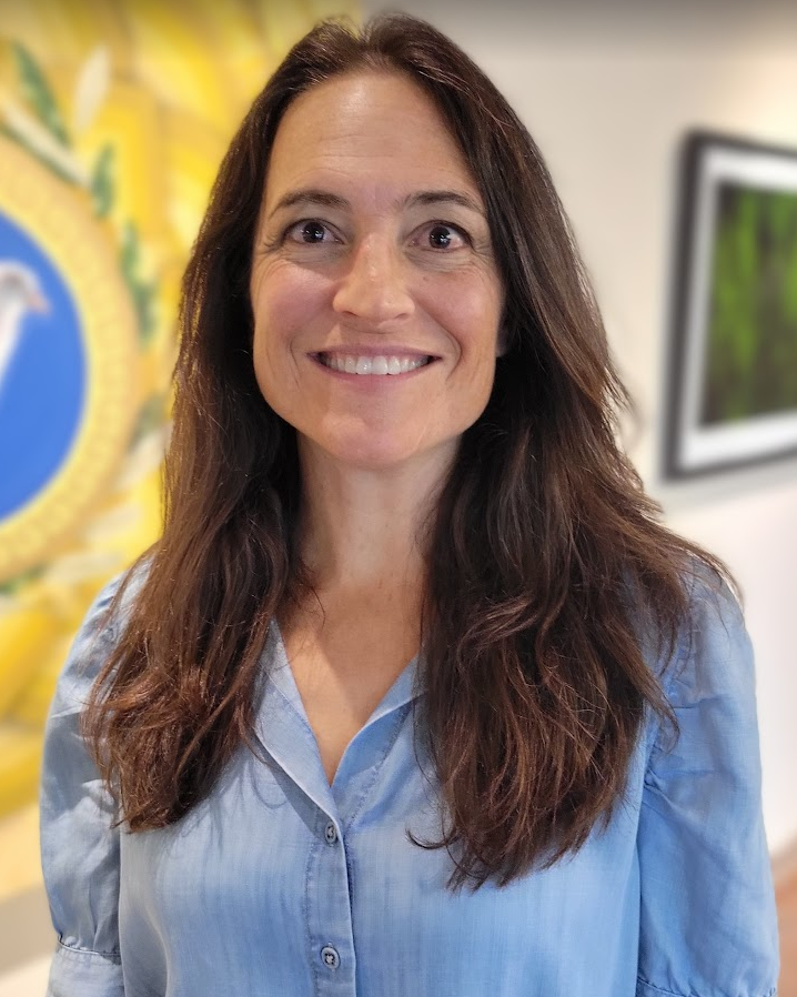 A person smiling for the camera.