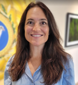 A person smiling for the camera.