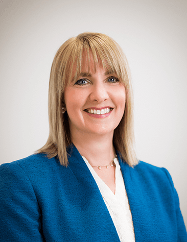 A person smiling for the camera.