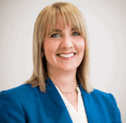 A person smiling for the camera.