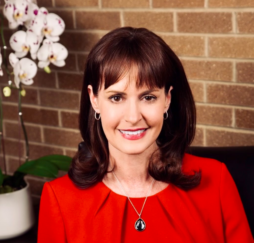 A person smiling for the camera.