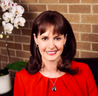 A person smiling for the camera.