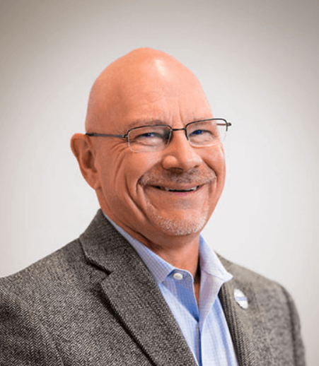 A man wearing glasses.