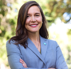 A woman with her arms crossed.