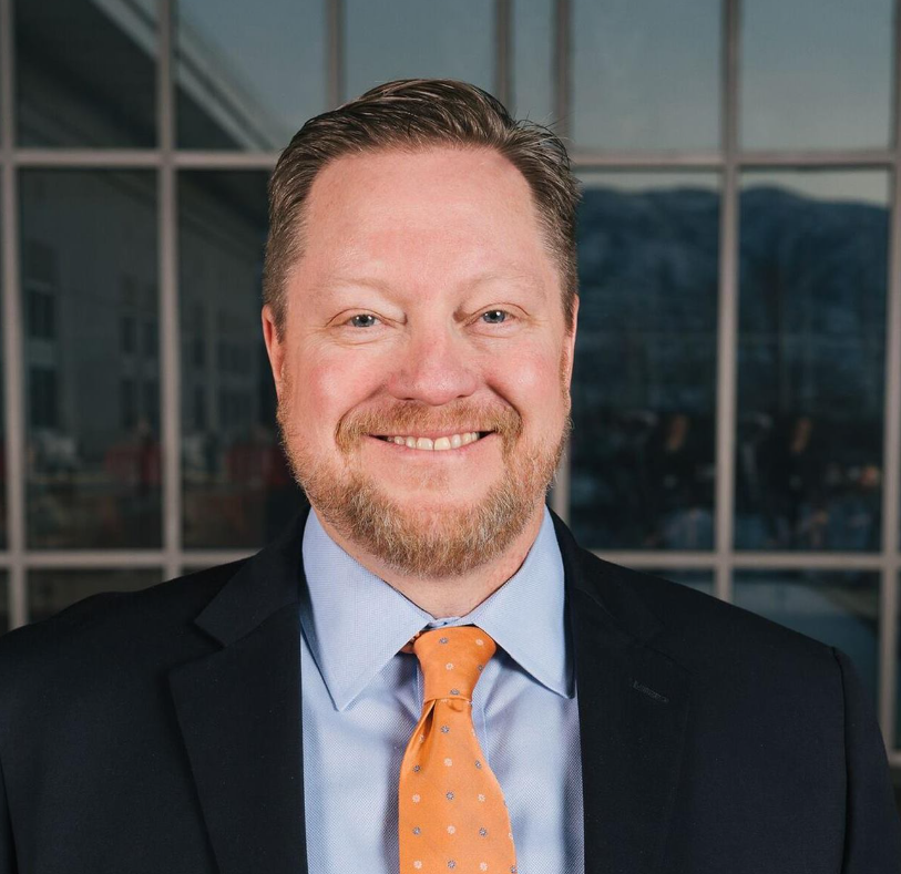 A man in a suit and tie.