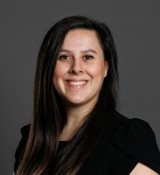 A person smiling for the camera.