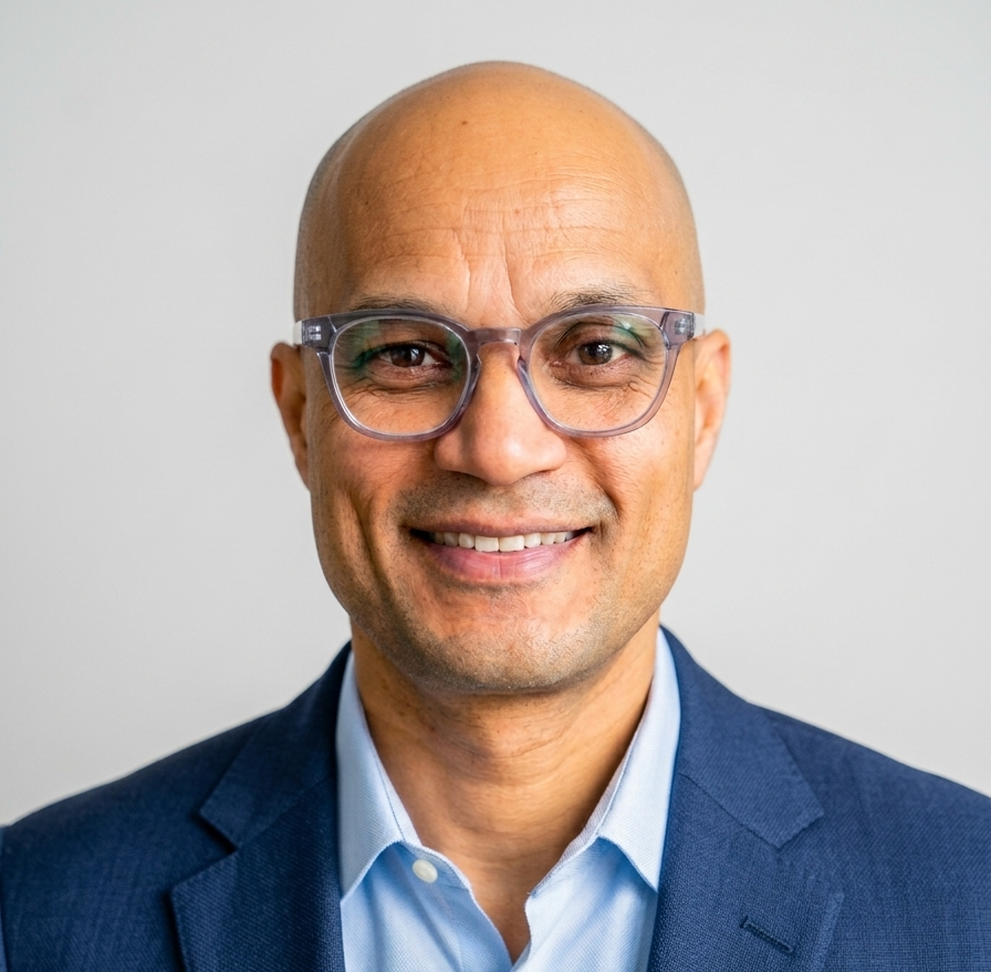 A man wearing glasses.