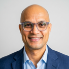 A man wearing glasses.