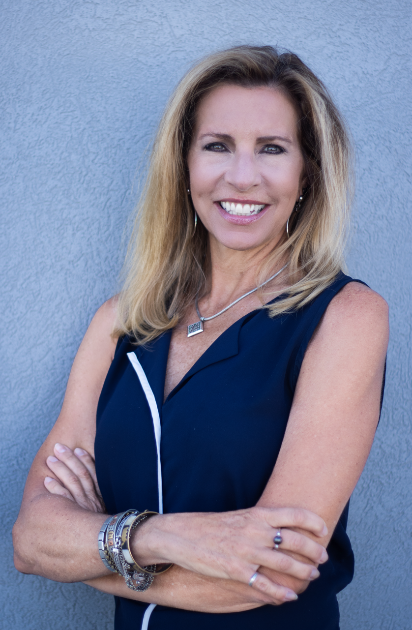 A woman with her arms crossed.