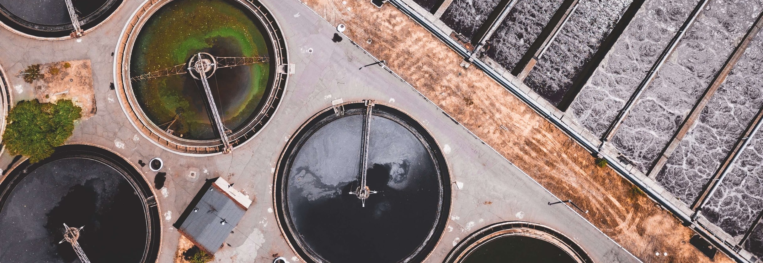 A circular building with a fountain.