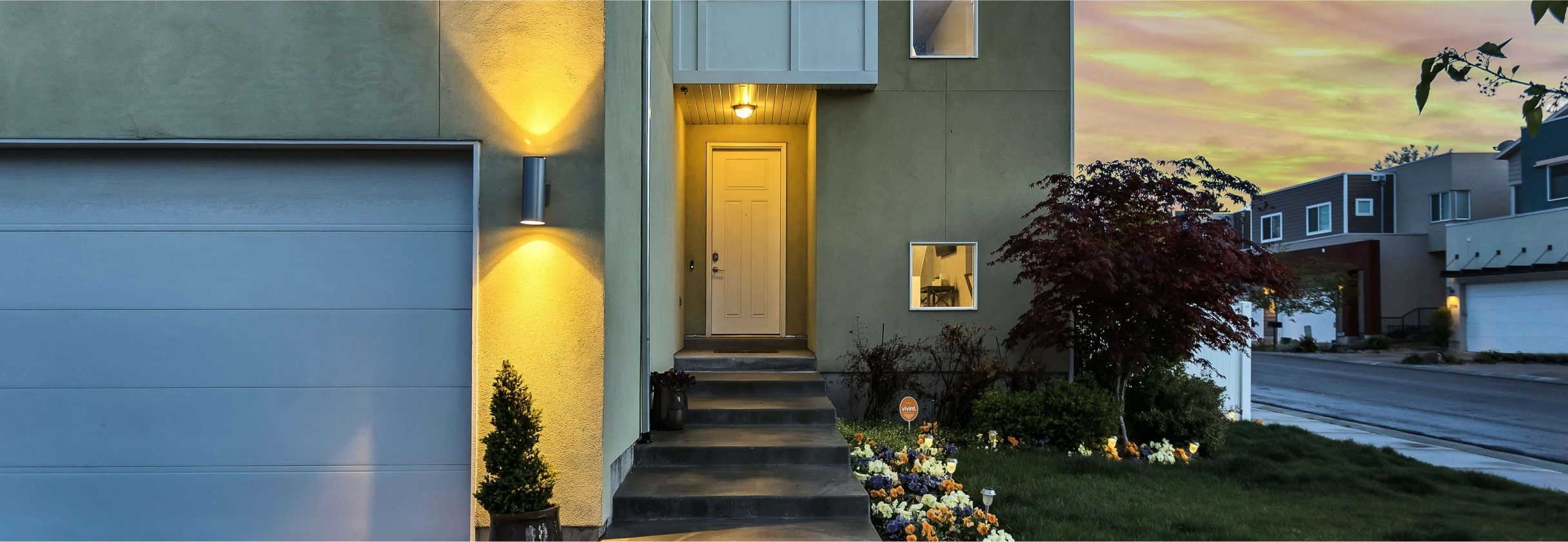 A building with a staircase and trees.