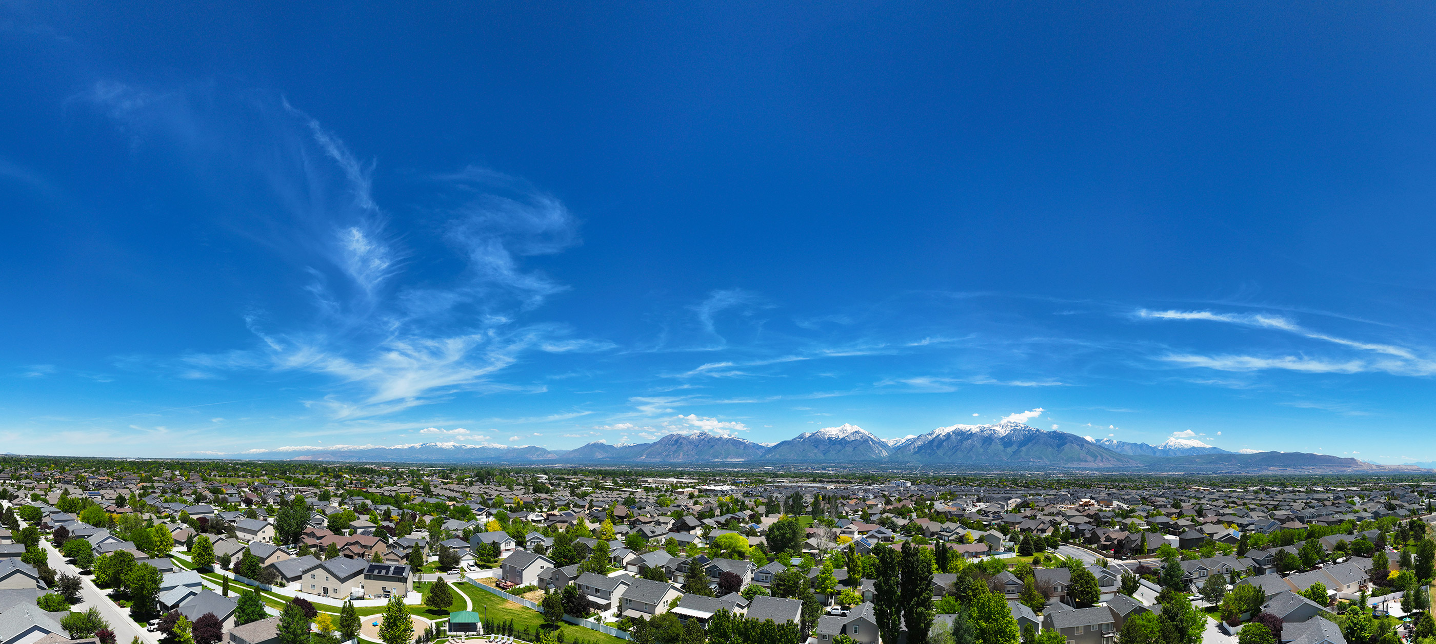 A city with mountains in the background.