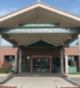 A building with a sign on the front.