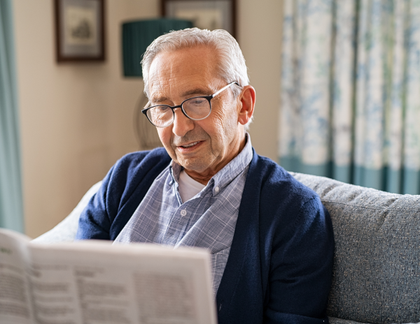 A man sitting on a couch.