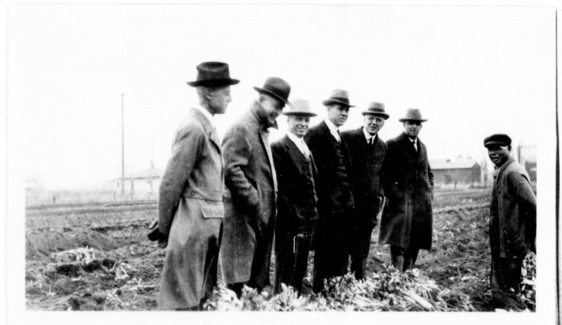 A group of men in hats.