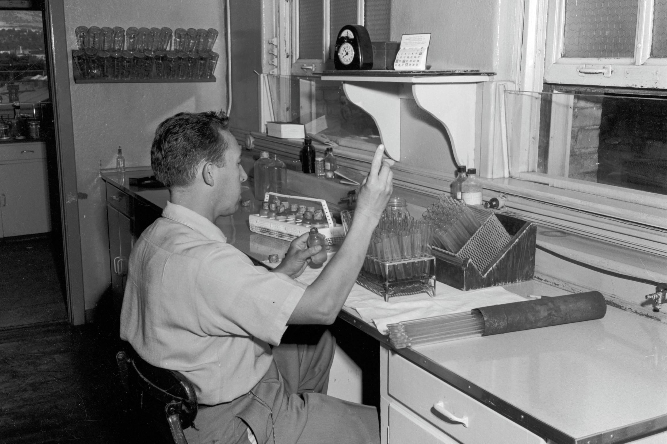 A man sitting at a desk.