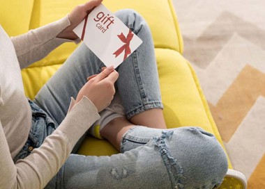 A person holding a book.