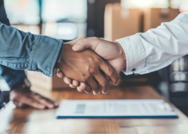 A close-up of people shaking hands.