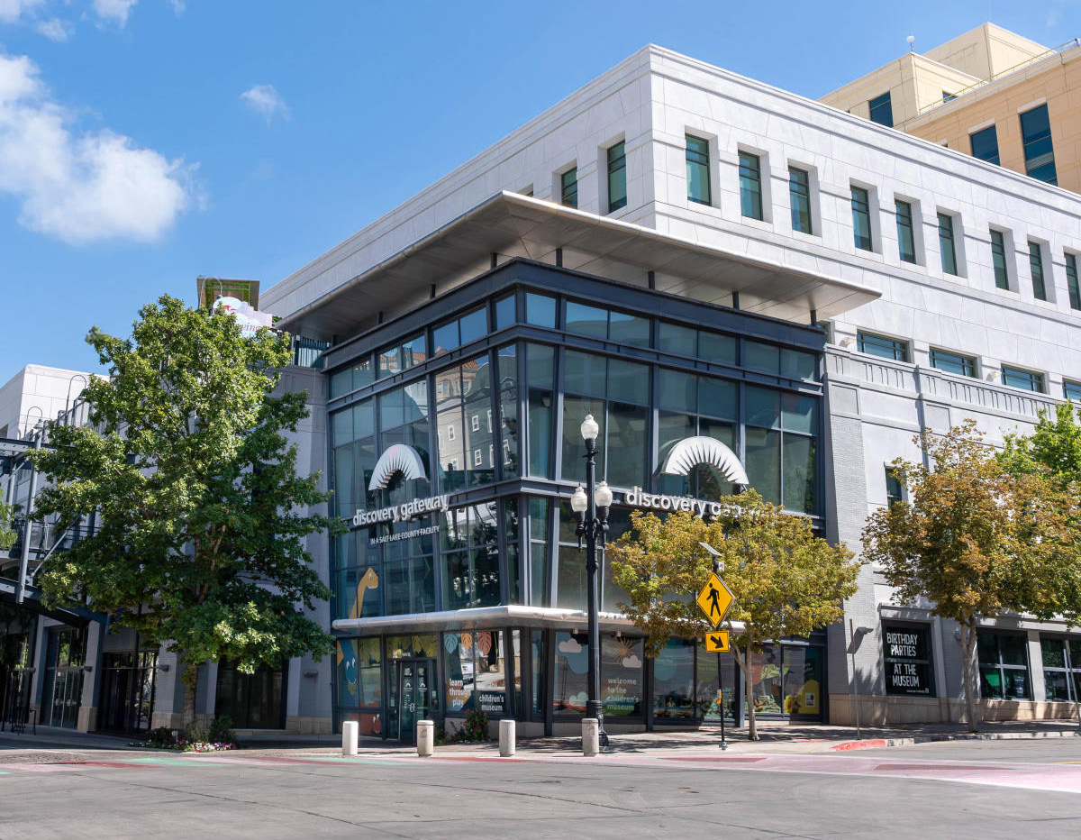 A building with trees and a street.