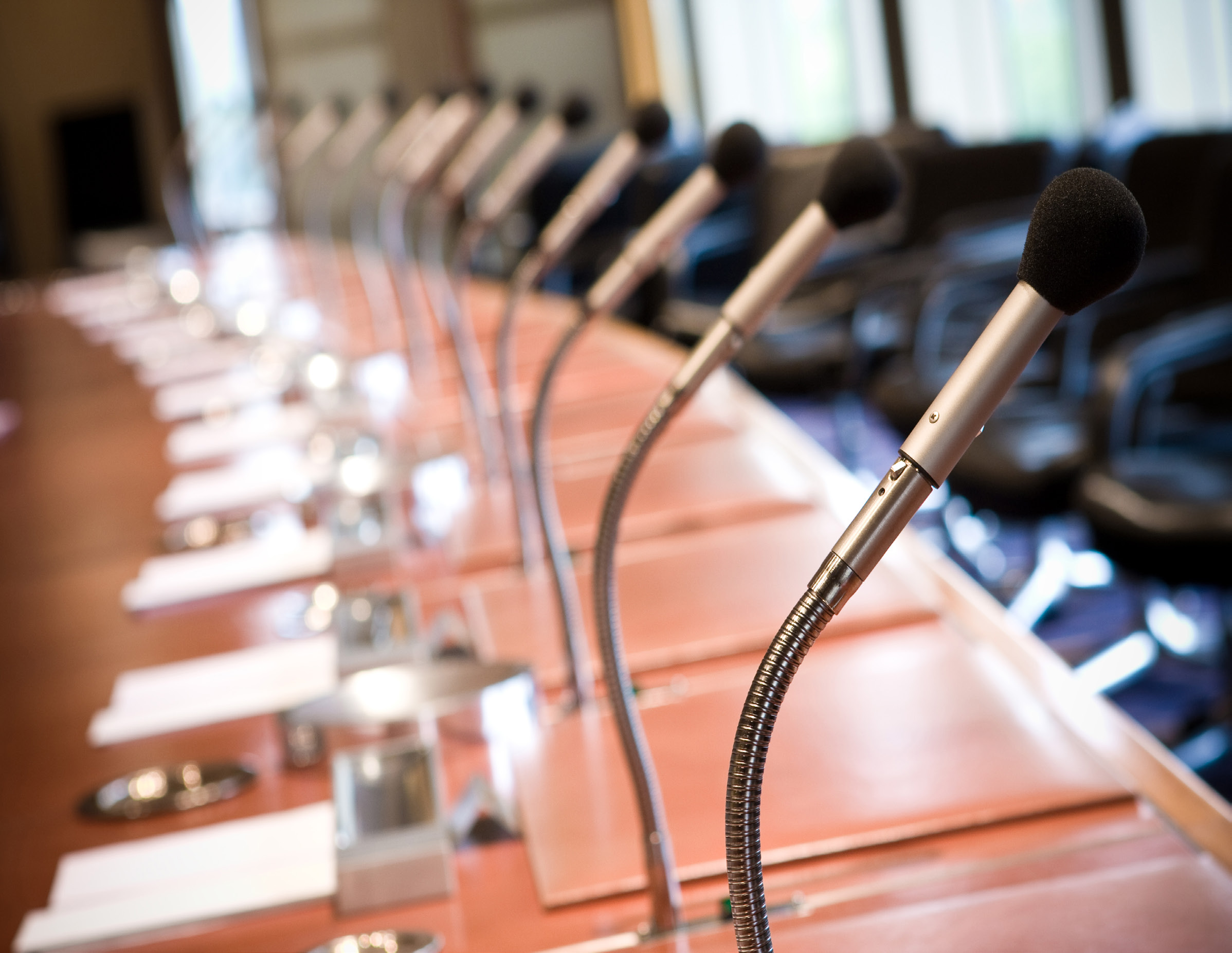 A microphone on a desk.
