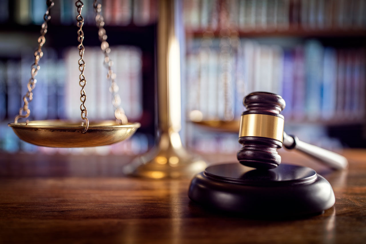 A close-up of a gavel and a gavel.