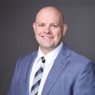 A man in a suit and tie.