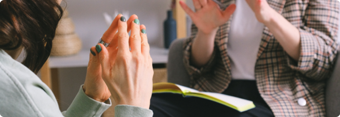 A person holding the hands up.