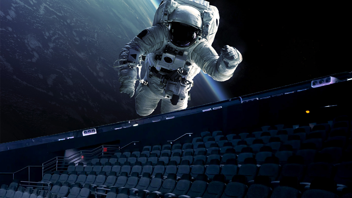 Image of an astronaut floating on the Clark Planetarium Dome theatre screen