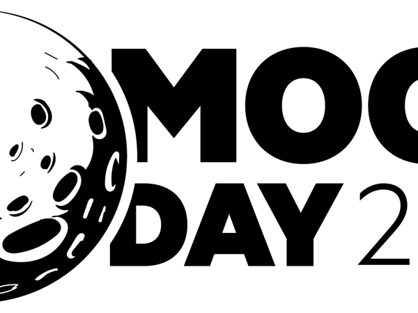 A black and white image of a car tire.