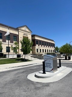A sign in front of a building.
