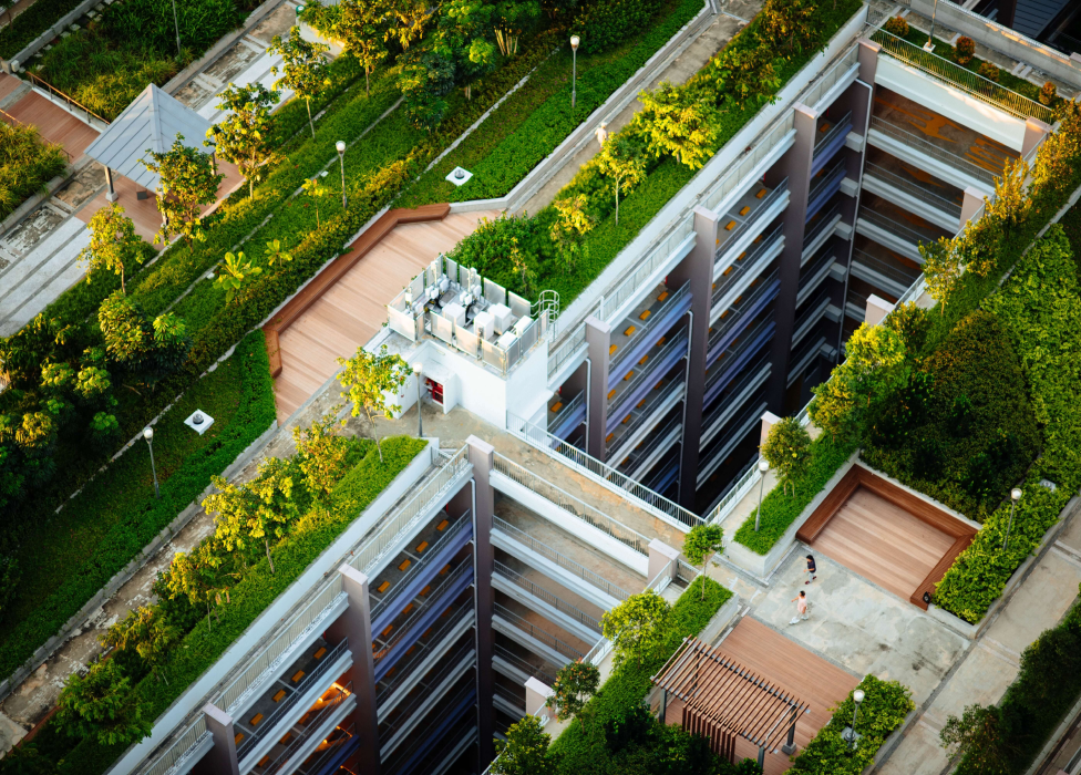 A building with a courtyard and trees.