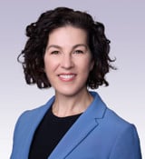 A person in a blue shirt.