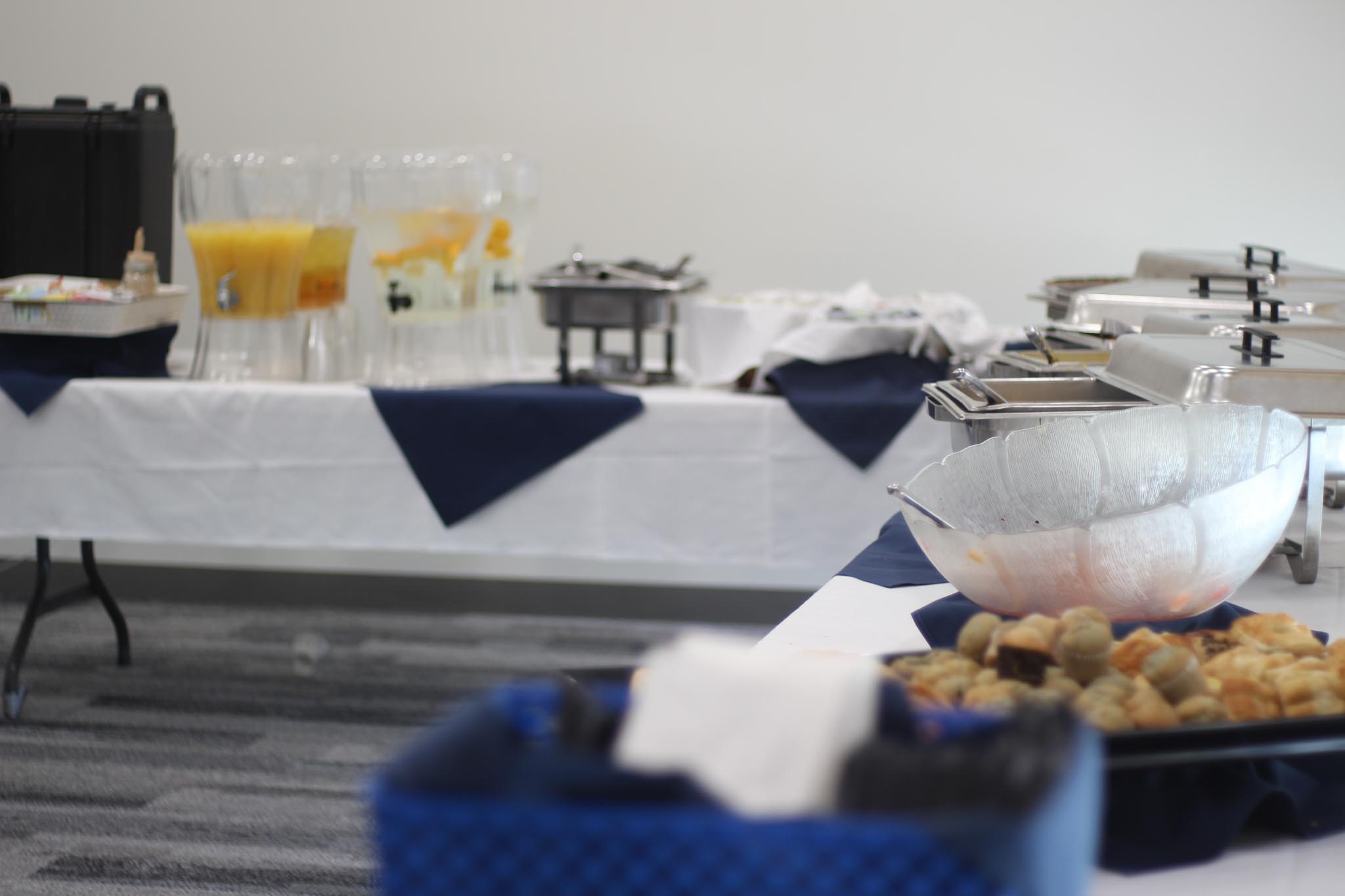 A table with food and drinks on it.