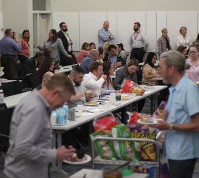 A group of people in a room.