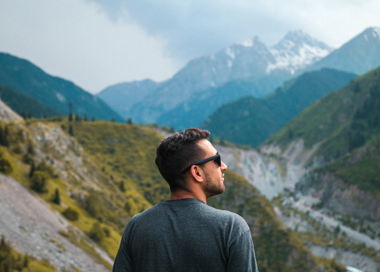 A man standing on a mountain.