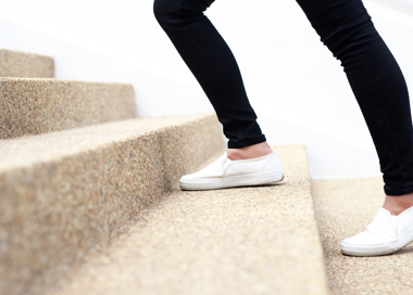 A person's legs and feet.