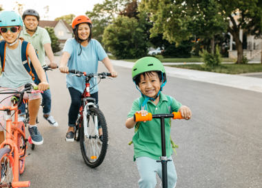 A group of people on bicycles.