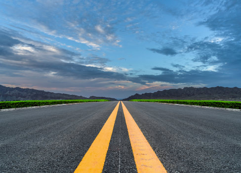 A road with yellow lines.
