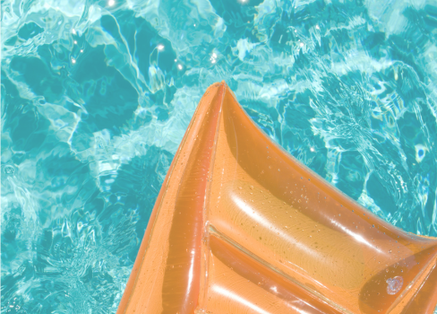 A close-up of a person's foot in water.