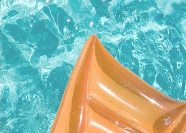 A close-up of a person's foot in water.