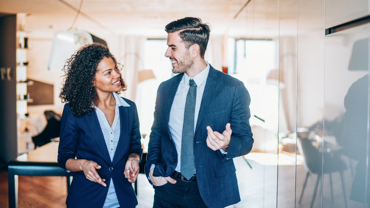 A man and a woman talking.