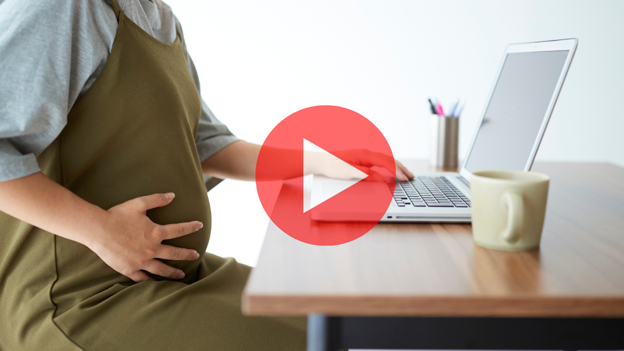 A man with a heart shaped logo.