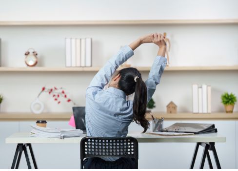 A person sitting at a desk.